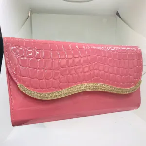 Baby Pink Gold bar clutch from STYLEHEIST